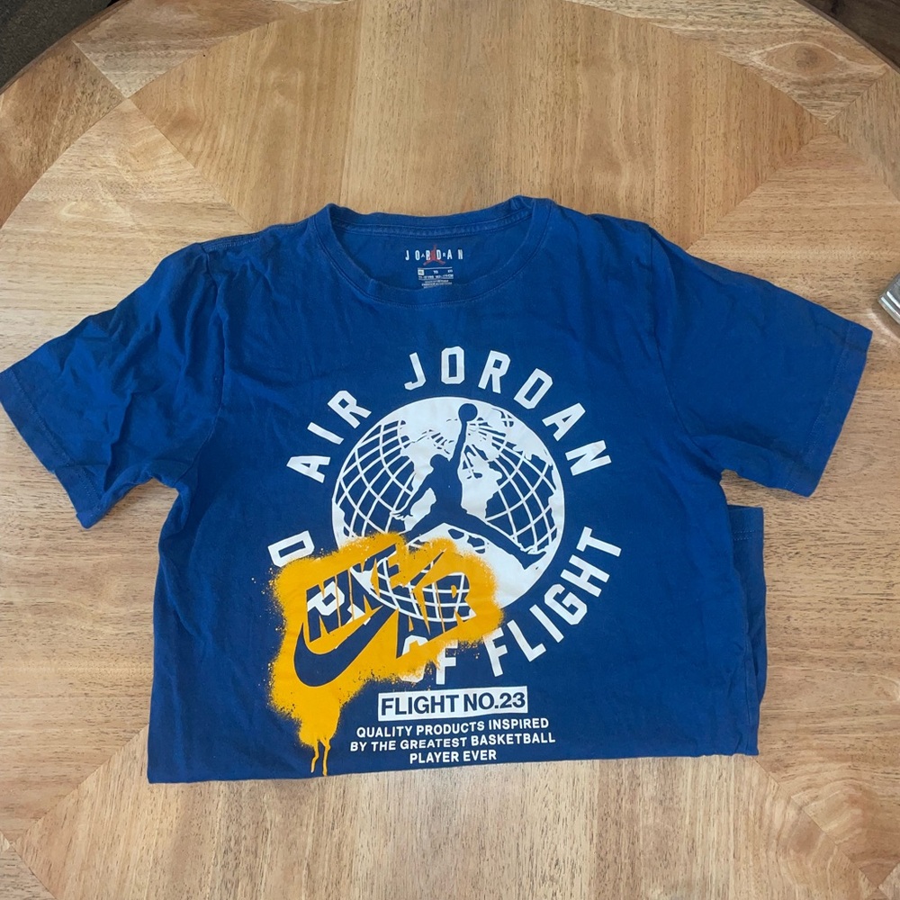 Jordan Boys T Shirt $8
Used but still lots of life. 
blue/white/yellow
